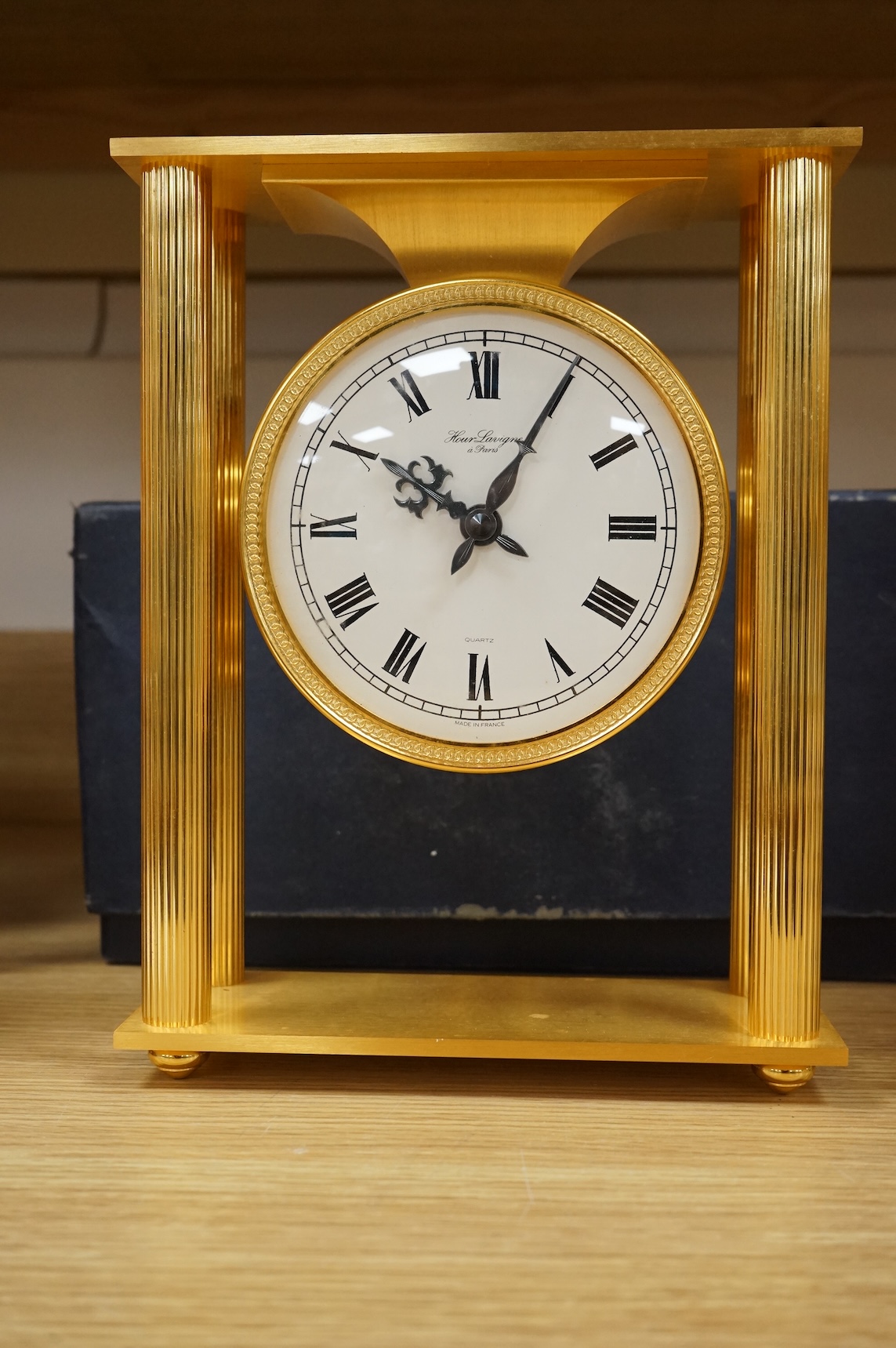 A 1970's Hour Lavigne gilt bronze clock, boxed, 26cm
